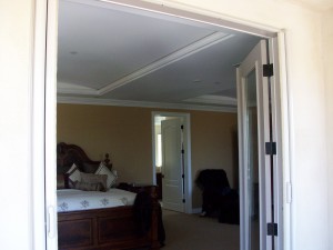 Retracted screens in master bedroom