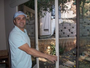 Grab the other door and do the same | Hollywood Retractable Screen Doors
